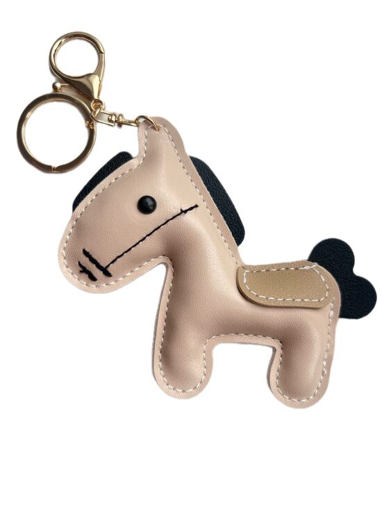 Ādas zirga piekariņš bēšs